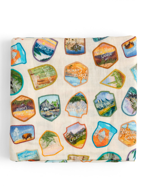 National Park Badges Muslin Baby Swaddle Blanket, 1 of 2