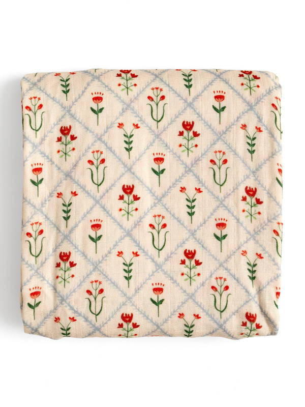 Scandinavian Folk Floral Diamond Muslin Baby Swaddle Blanket, 1 of 3