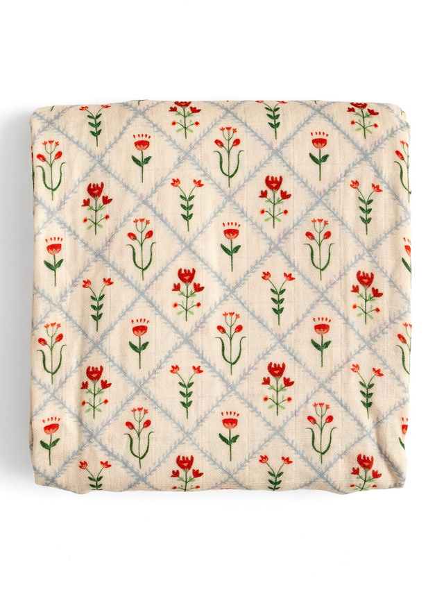 Scandinavian Folk Floral Diamond Muslin Baby Swaddle Blanket, 1 of 3