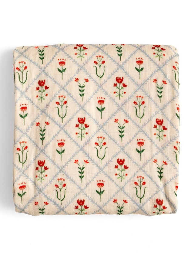 Scandinavian Folk Floral Diamond Muslin Baby Swaddle Blanket, 1 of 3