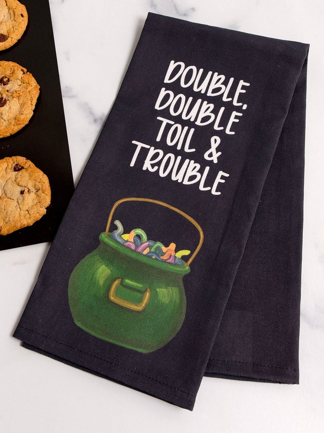 Cauldron Candy Halloween Kitchen Tea Towel, 1 of 3